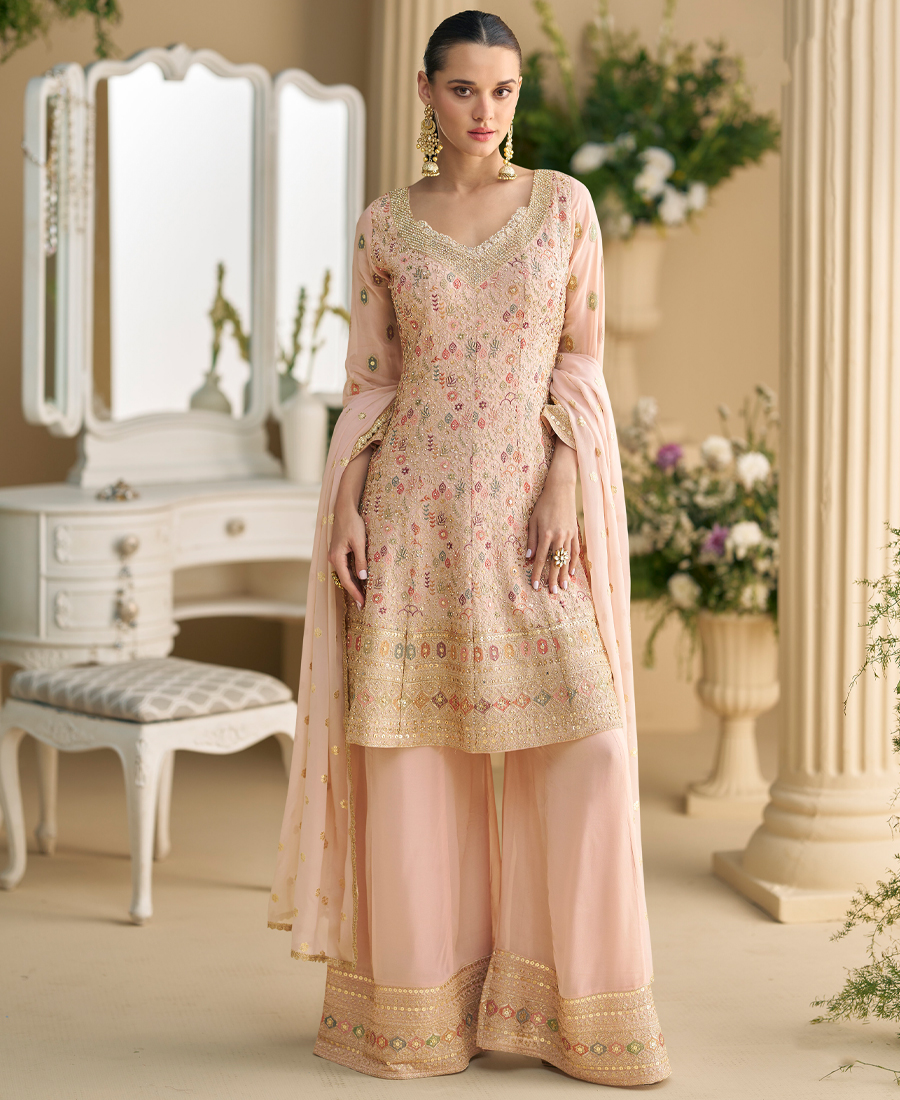Heavy Wedding Wear Pink Georgette Peplum...