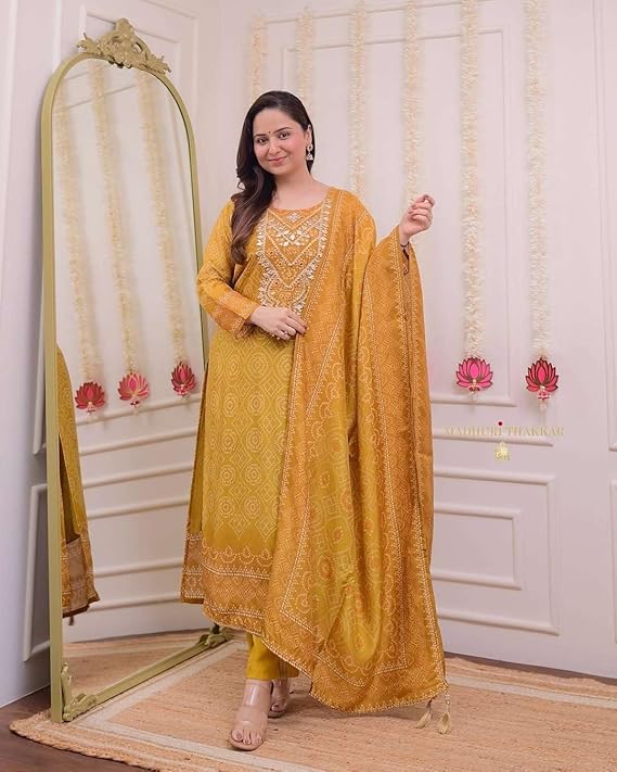 Women's Silk Embroidered Straight Kurti...